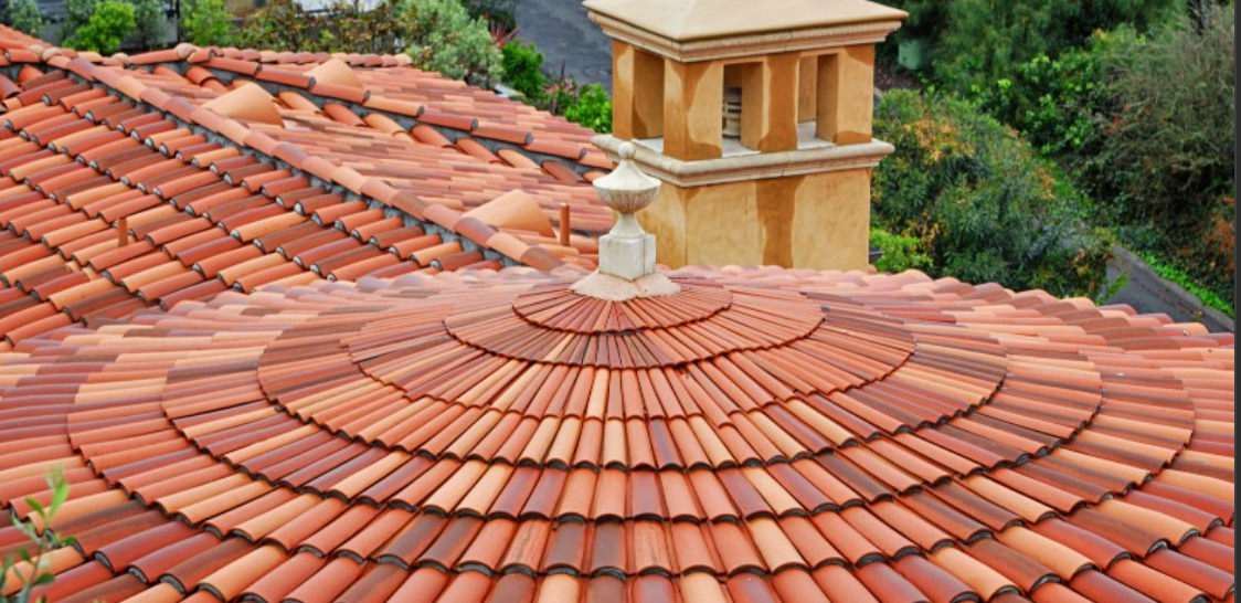 a couple of people that are on a roof